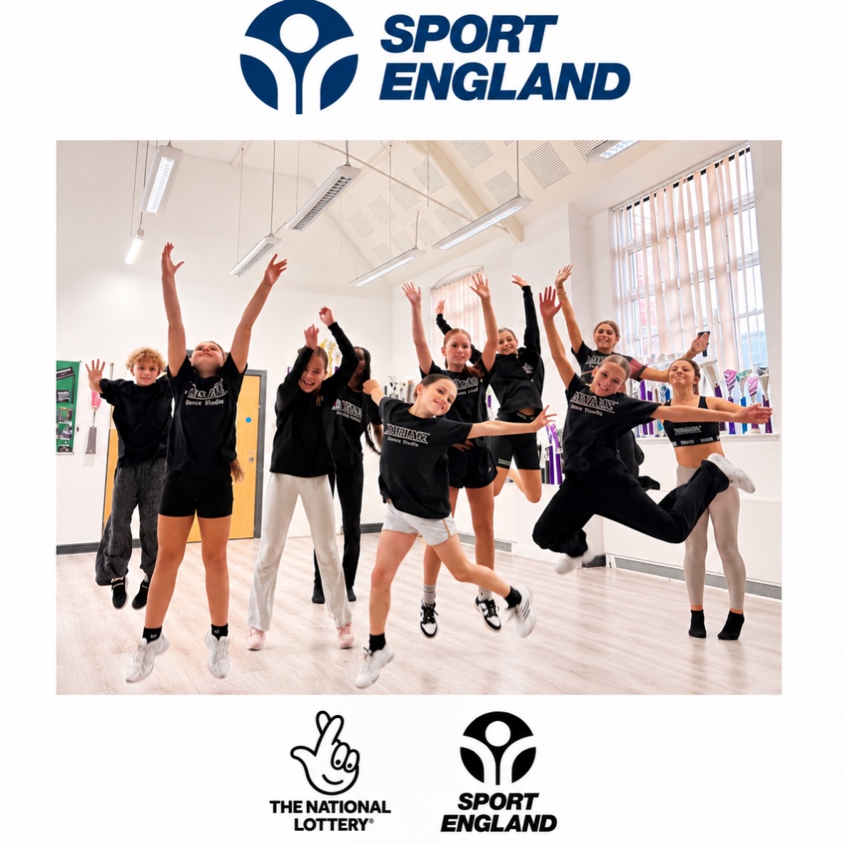 Starlight Darians dancers celebrating their Sport England award